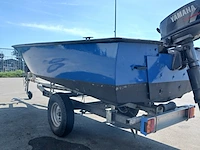 Toer boot met buitenboordmotor en trailer - afbeelding 3 van  36