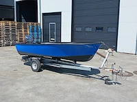Toer boot met buitenboordmotor en trailer - afbeelding 1 van  36