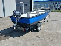 Toer boot met buitenboordmotor en trailer - afbeelding 23 van  36