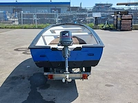 Toer boot met buitenboordmotor en trailer - afbeelding 31 van  36