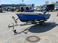 Toer boot met buitenboordmotor en trailer - afbeelding 34 van  36