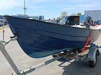 Toer boot met buitenboordmotor en trailer - afbeelding 2 van  47