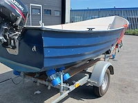 Toer boot met buitenboordmotor en trailer - afbeelding 5 van  47