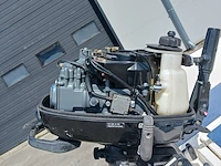 Toer boot met buitenboordmotor en trailer - afbeelding 25 van  47