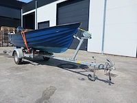 Toer boot met buitenboordmotor en trailer - afbeelding 29 van  47