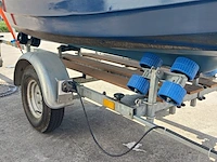 Toer boot met buitenboordmotor en trailer - afbeelding 36 van  47