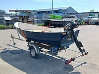 Toer boot met buitenboordmotor en trailer - afbeelding 43 van  47