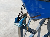 Toer boot met elektrische buitenboordmotor en trailer - afbeelding 28 van  44