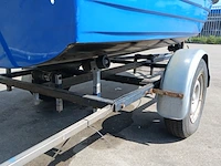Toer boot met elektrische buitenboordmotor en trailer - afbeelding 36 van  44