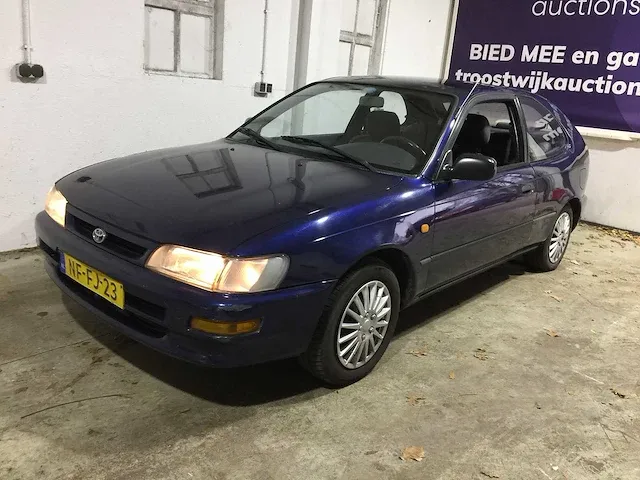 Toyota - corolla - 1.3i sport lpg g3- nf-fj-23 - afbeelding 1 van  18