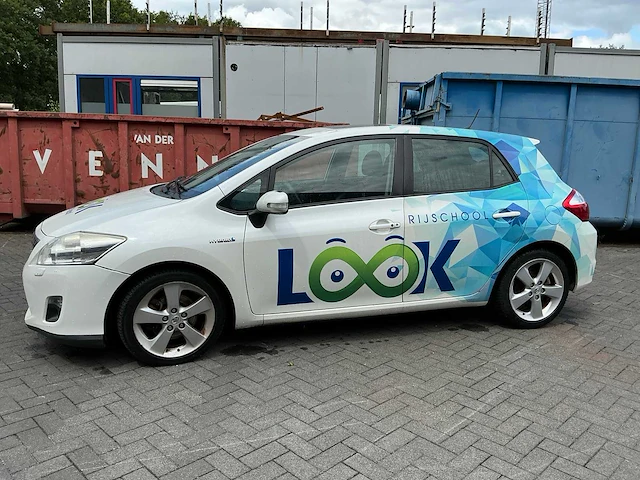 Toyota auris 1.8 full hybrid lesauto - afbeelding 1 van  45