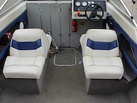 Trailer met speedboot bayliner capri buddy 1952 wit blauw met motor mercruiser 110,4/150,0 pk - afbeelding 6 van  21