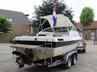 Trailer met speedboot bayliner capri buddy 1952 wit blauw met motor mercruiser 110,4/150,0 pk - afbeelding 8 van  21