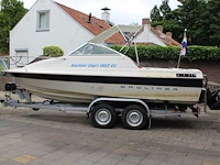 Trailer met speedboot bayliner capri buddy 1952 wit blauw met motor mercruiser 110,4/150,0 pk - afbeelding 9 van  21