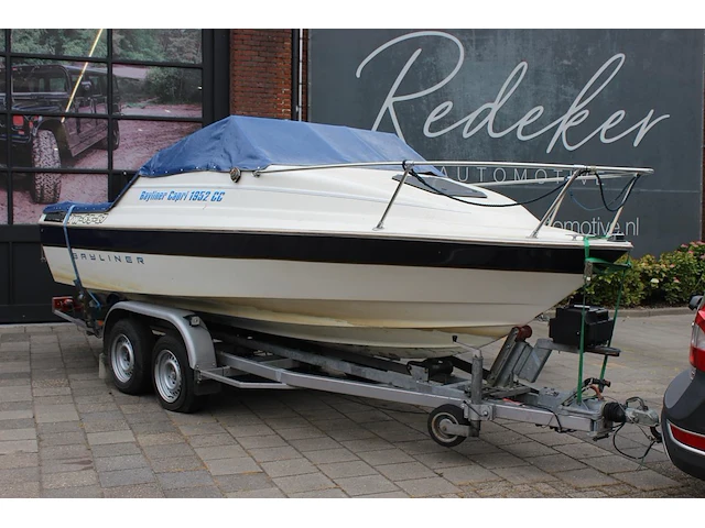 Trailer met speedboot bayliner capri buddy 1952 wit blauw met motor mercruiser 110,4/150,0 pk - afbeelding 1 van  21