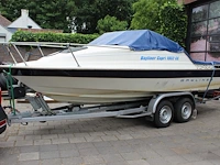 Trailer met speedboot bayliner capri buddy 1952 wit blauw met motor mercruiser 110,4/150,0 pk - afbeelding 12 van  21