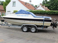 Trailer met speedboot bayliner capri buddy 1952 wit blauw met motor mercruiser 110,4/150,0 pk - afbeelding 15 van  21