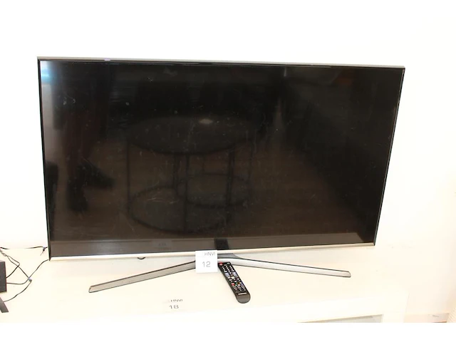 Tv samsung 49 inch op statief met afstandsbediening. - afbeelding 1 van  1