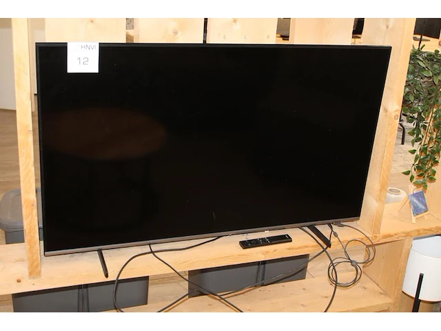 Tv samsung 49 inch op statief met afstandsbediening. - afbeelding 1 van  5