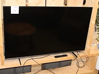 Tv samsung 49 inch op statief met afstandsbediening. - afbeelding 1 van  5