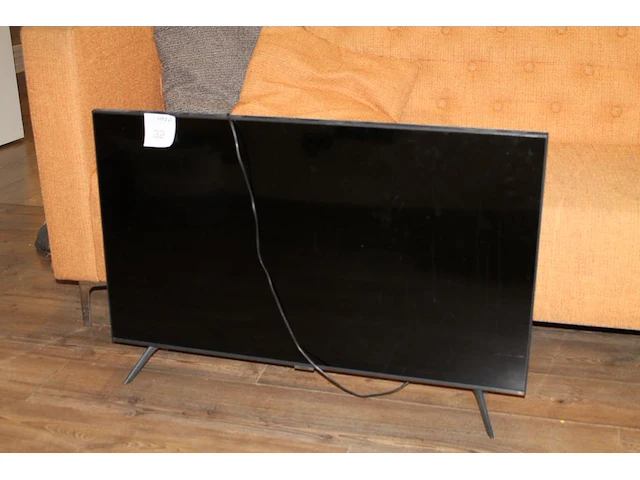 Tv samsung 49 inch op statief met afstandsbediening. - afbeelding 1 van  2
