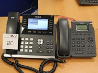 Twee bureautelefoons yealink t46g. - afbeelding 1 van  1