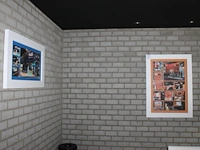 Twee lijsten met beursprints en reclameopdruk. afmetingen twee maal 65 x 85 cm en een maal 80 x 110 cm. - afbeelding 1 van  1
