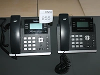 Twee telefoontoestellen yealink ultra-elegant gigabit ip phone sip-t42s. - afbeelding 1 van  1