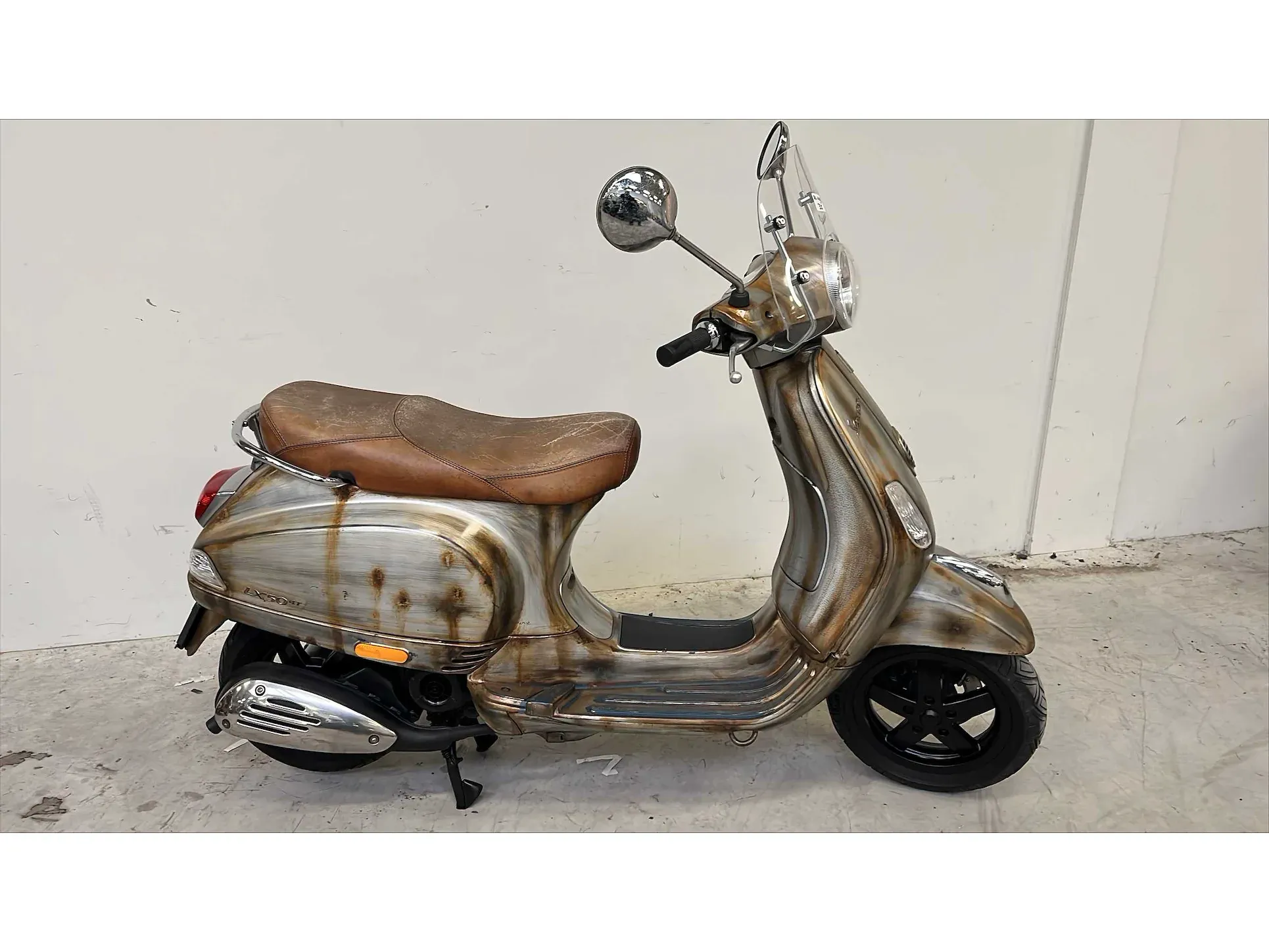 Verzamelveiling motoren en scooters