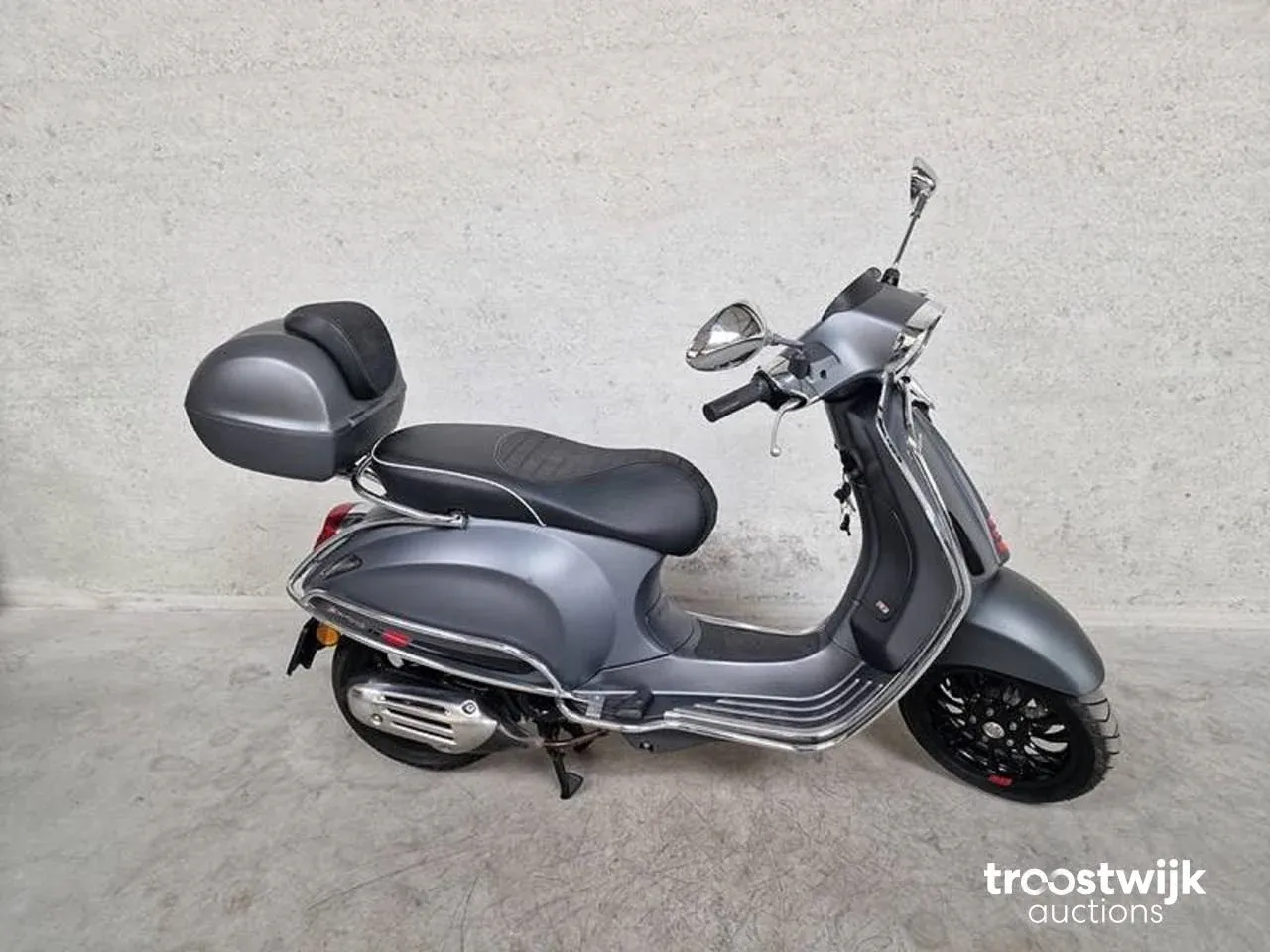 Verzamelveiling motoren en scooters