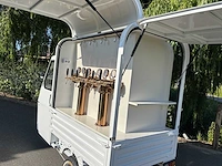 Vespa - drafts - ape - e-scooter foodtruck 2025 - afbeelding 22 van  24