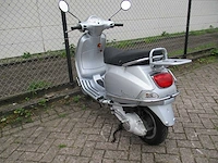 Vespa - motorscooter - lx 125 - motorfiets - afbeelding 2 van  11