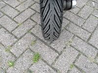 Vespa - motorscooter - lx 125 - motorfiets - afbeelding 6 van  11