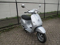 Vespa - motorscooter - lx 125 - motorfiets - afbeelding 7 van  11