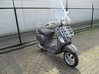 Vespa - snorscooter - lxv vie della moda 4t - scooter - afbeelding 8 van  12