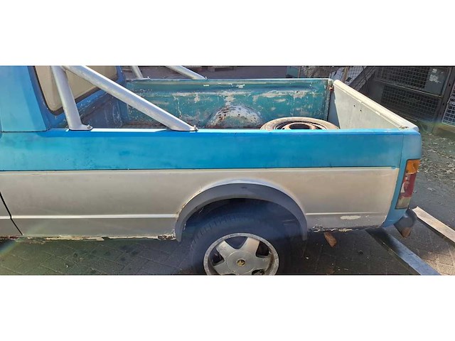 Volkswagen - pickup - caddy - duits - afbeelding 10 van  12