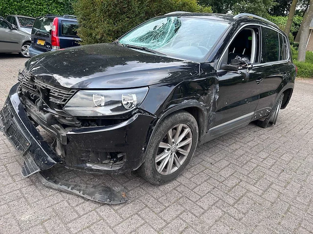 Volkswagen - tiguan - 1.4 tsi sport & style - car - afbeelding 1 van  19