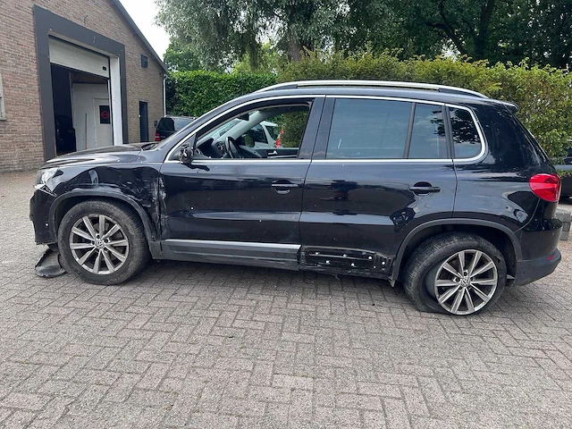 Volkswagen - tiguan - 1.4 tsi sport & style - car - afbeelding 2 van  19