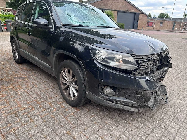 Volkswagen - tiguan - 1.4 tsi sport & style - car - afbeelding 6 van  19