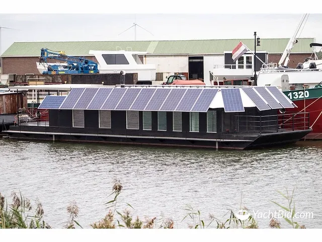 Waterloft woonschip 18 meter - motor yacht - afbeelding 1 van  58