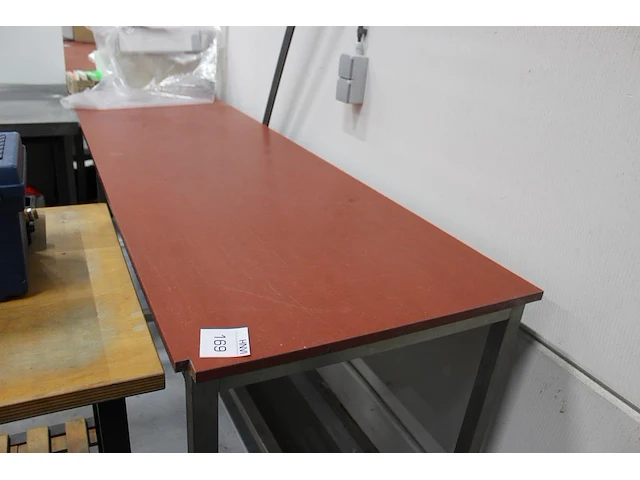Werktafel met kunststof blad en rvs onderstel wijdeven & zn. afmeting 250 x 70 x 90 cm. let op: klein hoekj... - afbeelding 1 van  3