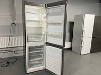 Whirlpool - whirlpool grijs koelkast + toyota naaimachine + el. heater convector - afbeelding 10 van  15