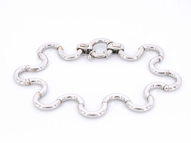 Witgouden armband van het italiaance merk unoaerre italian brev: gold hinged swirl link armband - afbeelding 1 van  8