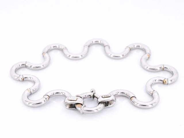 Witgouden armband van het italiaance merk unoaerre italian brev: gold hinged swirl link armband - afbeelding 3 van  8