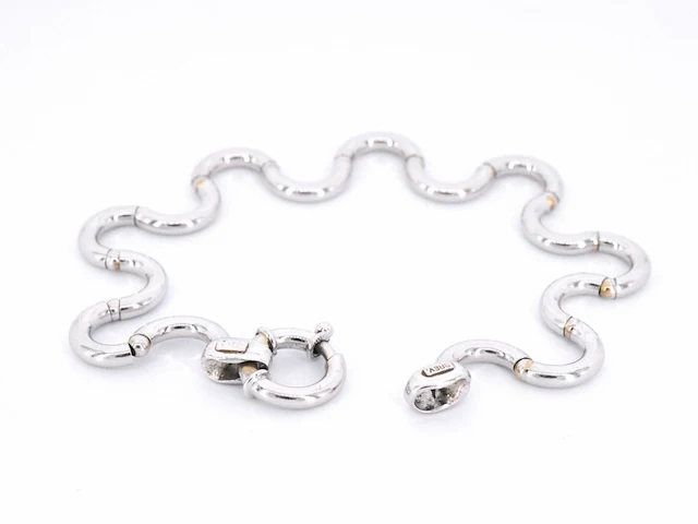 Witgouden armband van het italiaance merk unoaerre italian brev: gold hinged swirl link armband - afbeelding 4 van  8