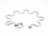Witgouden armband van het italiaance merk unoaerre italian brev: gold hinged swirl link armband - afbeelding 4 van  8