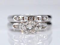 Witgouden dubbele ring met een briljant geslepen diamant - afbeelding 1 van  8
