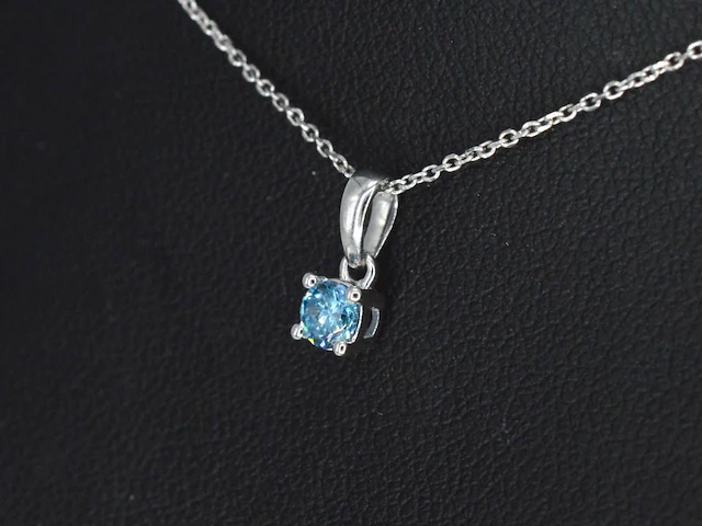 Witgouden halsketting met een blauwe diamant 0.25 carat - afbeelding 4 van  7