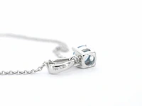Witgouden halsketting met een blauwe diamant 0.25 carat - afbeelding 7 van  7