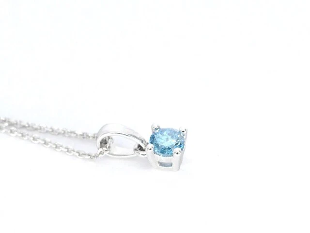 Witgouden halsketting met een blauwe diamant 0.25 carat - afbeelding 5 van  7